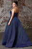 Stunning Strapless ball gown with glitter finish and lace up corset back.